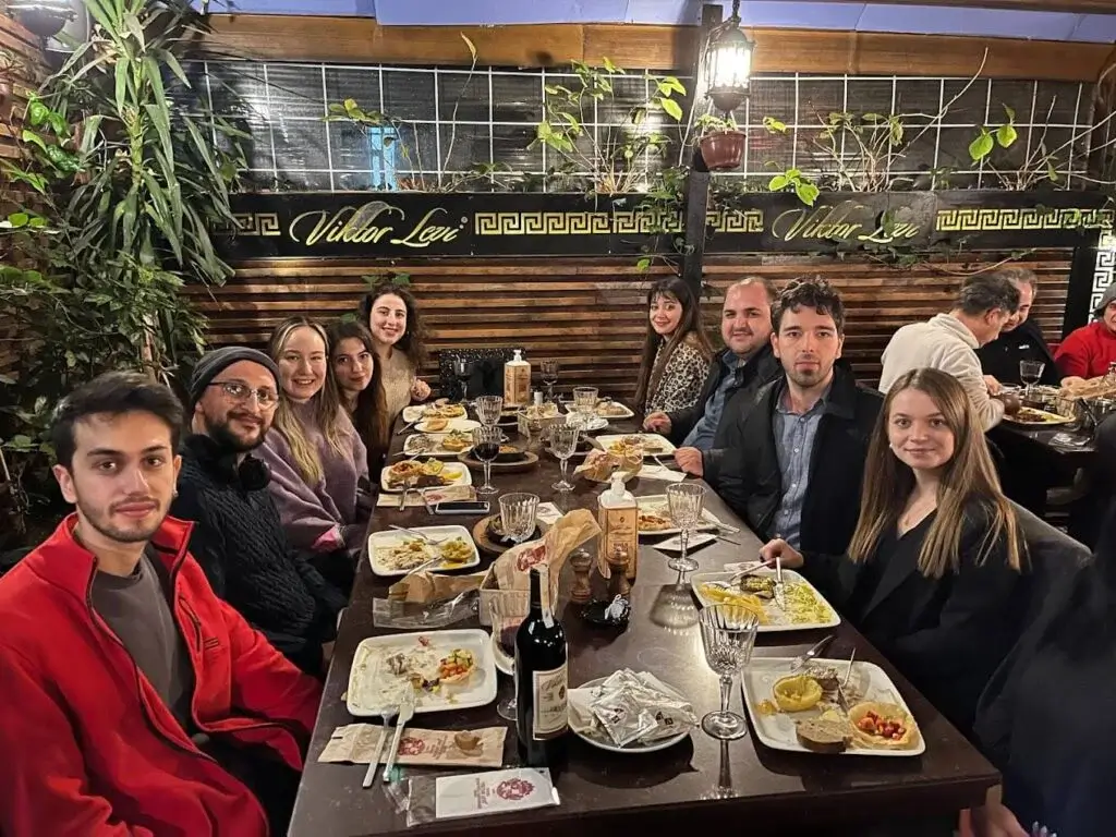 Roible team gathered around the dinner table